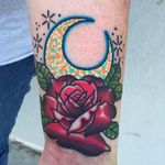 Solid looking red rose tattoo with a crescent moon. Tattoo by Katie McGowan. #katiemcgowan #blackcobratattoo #coloredtattoo #rose #moon