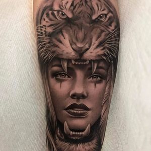 Head of a hero by Jamie Mahood #JamieMahood #realism #realistic #hyperrealism #blackandgrey #portrait #ladyhead #lady #lips #eyes #tiger #junglecat #wildlife #cat #fangs #tattoooftheday