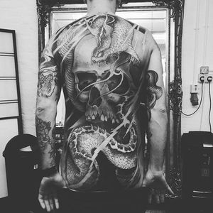 Whoa. Just whoa. #JoaoBosco #Fantasy #FantasyTattoos #Skull #Snake #back #backpiece #bodysuit #horror #blackandgrey