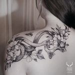 Fine line tattoo by Zihwa. #Zihwa #SouthKorean #SouthKorea #fineline #floral #blackandgrey #flower #snake