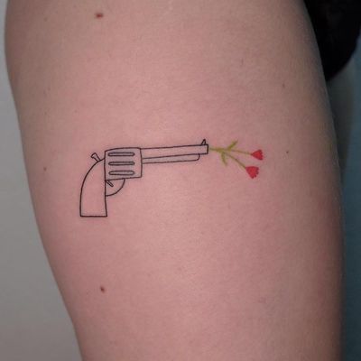 bullet cross tattoo