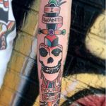 Fun inclusion of Misfits lyrics and mascot in a traditional style. Tattoo by Bobby Ellis #TheMisfits #punk #crimsonghost #horror #classicmovie #band #skull #fiendclub #dagger #BobbyEllis #traditional