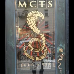 The front door of Magic Cobra Tattoo Society (IG—magiccobratattoo). #MagicCobraTattooSociety #NYCtattooshops #Williamsburg