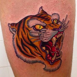 Intense looking tiger head tattoo done by Rafa Serrano. #RafaSerrano #LTWtattoo #neotraditional #coloredtattoo #tiger #tigerhead