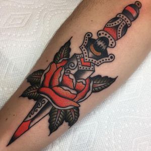 Rose tattoo by Andrew Vidakovitch #AndrewVidakovitch #rosetattoos #color #traditional #rose #flower #floral #leaves #plant #knife #dagger #sword #pattern