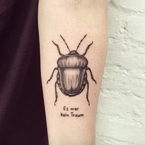 A beetle with the phrase "It was not a dream" in German by Tanya De Souza-Meally (IG—tanya_dsm). #beetle #FranzKafka #literarytattoo #TanyaDeSouzaMeally #TheMetamorphosis