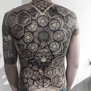 Massive and super detailed back tattoo done by Paul Davies. #pauldavies #blacktattoo #illustrativetattoo #geometrictattoo #dotstolines