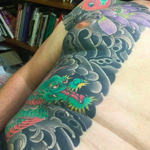Intense work on the side part of the torso. Tattoo by Amar Goucem. #AmarGoucem #dragontattooNL #JapaneseStyle #horimono #koi #lotus #dragon
