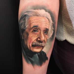 A demure looking Albert Einstein. Tattoo by Mick Squires. #realism #colorrealism #MickSquires #TheBlackMark #AlbertEinstein