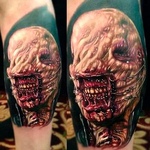 The Chatterer cenobite is a classic favorite and this tattoo has striking detail by Paul Acker #hellraiser #cenobite #horror #movie #chatterer #realism #PaulAcker