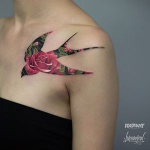 Sparrow shape encapsulates roses, by Andrey Lukovnikov. (via IG—lukovnikovtattoo) #neotraditional #color #silhouette #ukraine #AndreyLukovnikov