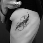 Delicate feather tattoo by Fliquet Renouf. #blackwork #linework #FliquetRenouf #feather
