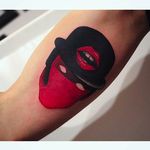 Faceless man and red lips tattoo by @maradentattoo #maradentattoo #black #red #blackandredtattoo #oddtattoos #faceless #lips