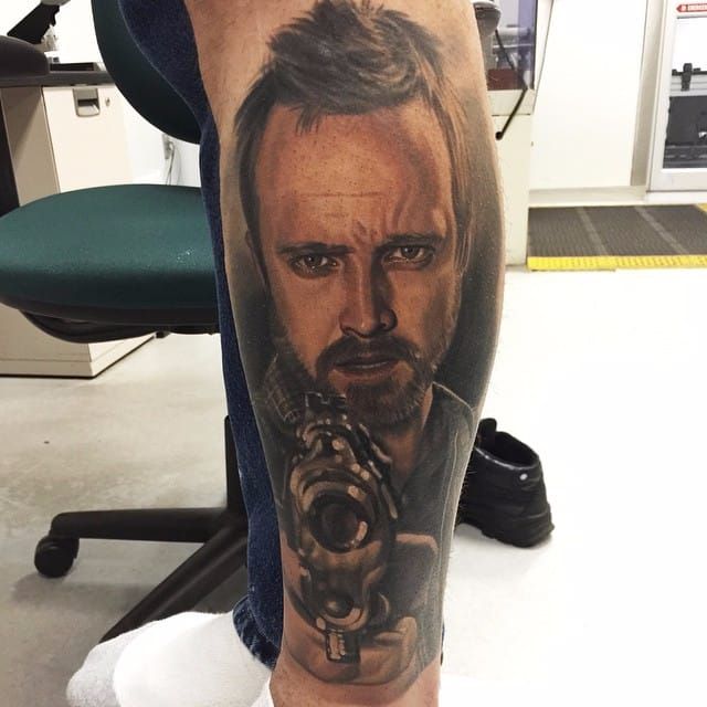 Psychedelic Jesse Pinkman portrait tattoo on the calf