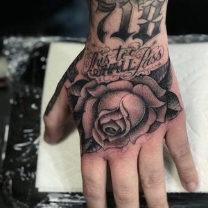Rose and text tattoo by Big Steve #BigSteve #letteringtattoos #blackandgrey #chicano #realistic #oldschool #mashup #rose #leaves #flower #floral #script #text #font #quote #thistooshallpass #handtattoo