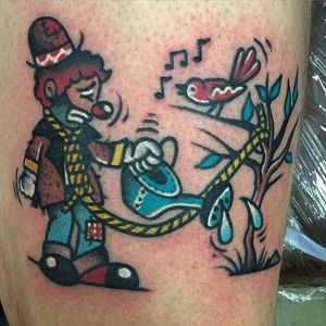 Hobo watering a plant Tattoo by Pancho #PanchosPlacas #Oldschool #Traditional #Clowntattoo #clown #plantwatering