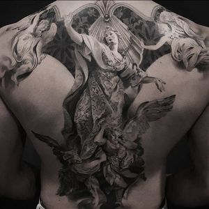 The placement on this Christian-themed back-piece by Jeong Hwi Jeon is unconventionally beautiful. #backpiece #blackandgrey #Christian #JeongHwiJeon #realism