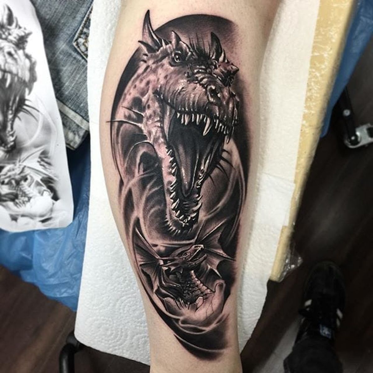 Tattoo uploaded by Stacie Mayer • Black and grey dragon tattoo by Chris
