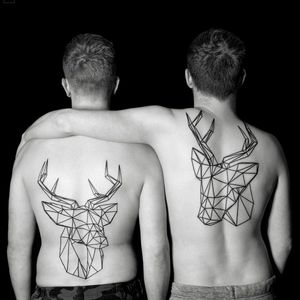 Geometric deer tattoos by Chaim Machlev dots to lines #ChaimMachlev #dotstolines #geometrictattoos #blackwork #linework #deer #antlers #matchingtattoos #tattoooftheday