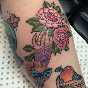 Neo traditional hand and camellia flower tattoo by Ebony Mellowship. #neotraditional #hand #flower #camellia #EbonyMellowship