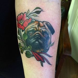 Sweet looking pug tattoo by Jasmin Austin. #dog #pug #flower #neotraditional #JasminAustin