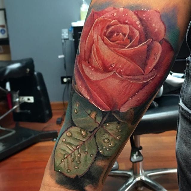 water drop on rose tattoo