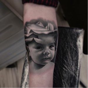 Realistic Portrait Tattoo of a rose turning into baby by Poland Rybnik @Karolrybakowski #PolandRybnik #InkognitoTattoo #Realistic #Painter #Style #Child #Children #portrait #rose #baby #blackandgray