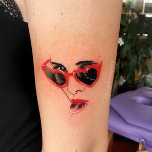 Lolita tattoo by Shannon Perry #ShannonPerry #cooltattoos #color #realism #realistic #hyperrealism #Lolita #lollipop #sunglasses #hearts #lollipop #linework #movietattoo #portrait #lady #tattoooftheday