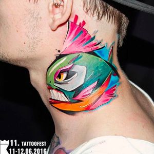 Fish tattoo by Spendlo that won 3rd place in Small Colour at Tattoofest. Photo taken from Instagram @tattoofestconvention #Krakow #TattooFest #Poland #cubism #fish #brightcolours #abstract #surrealism