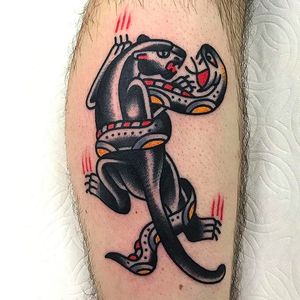 Panther battlin' a snake. Classic awesome work by Joshua Marks. #JoshuaMarks #ETS #traditionaltattoos #boldtattoos #classic #panther #snake
