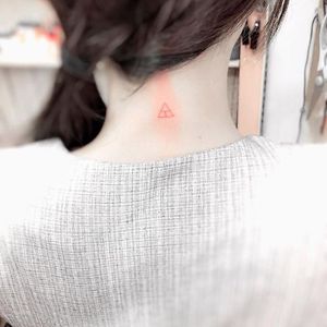 Simple triangle tattoo by Wei Ca #nape #mini #microtattoo #triangle #geometric