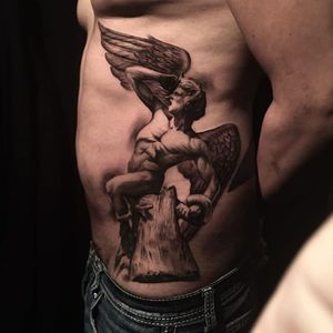 High contrast black and grey fallen angel tattoo by Miguel Camarillo. #blackandgrey #realism #MiguelCamarillo #angel #fallenangel