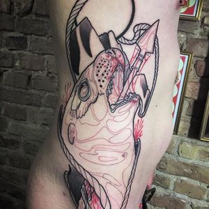 Read and black line work seal tattoo by Danne Tatowierer. #abstract #linework #blackandred #seal #DanneTatowierer #animal