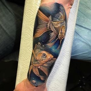 Color realism fish forearm tattoo by Poch Tattoos. #realism #colorrealism #PochTattoos #fish #aquatic