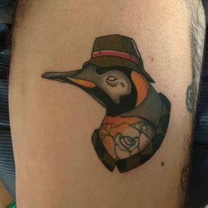 Penguin and hat tattoo done at the Grimm Tattoo #hattattoo #penguinganginahat #colourtattoo #penguin #hat