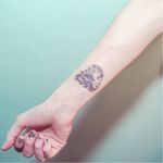 Lion tattoo by Ponto Tattoo #PontoTattoo #dotwork #pointillism #small #lion