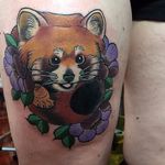 A precious red panda and flower thigh piece. #KittyDearest #neotraditional #redpanda #panda #flower