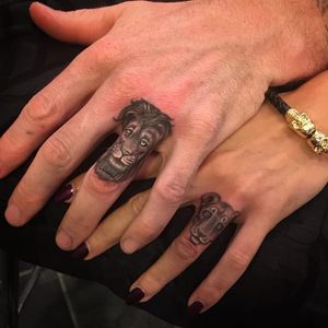 Amazing lion and lioness tattoos by Em Voltz #coupletattoos #coupletattoos #matchingtattoos #romantic #tattooedcouple #lovetattoos #liontattoo #lionesstattoo #fingertattoos #fingertattoo #ringfingertattoo