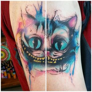 Chesire Cat Watercolor Tattoo by Josie Sexton #Watercolor #WatercolorTattoo #WatercolorTattoos #WatercolorArtists #WatercolorDesigns #WatercolorInspiration #JosieSexton