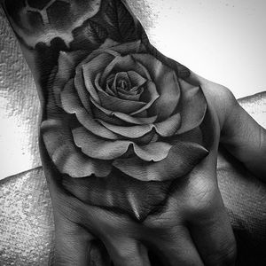 Bold and beautiful rose hand tattoo by Bobby Loveridge @bobbalicious_tattoo #black #blackandgray #churchyardtattoostudio #uk #rose #handtattoo