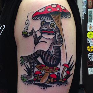 Tokin' frog chillin under a mushroom. Rad tattoo done by Bailey Tattooer. #BaileyTattooer #SacredElectric #traditionaltattoo #bizzare #frog #smoke #toke #mushroom #stoner