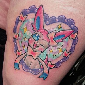 Sylveon tattoo by Mewo Llama. #MewoLlama #pokemon #videogames #anime #kawaii #cute #eevee #fairy #heart