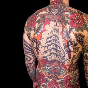 The symmetry here in Tom Tom's neo-traditional sailor backpiece (Instagram @tomtom_sunsettattoo) is perfect. #anchor #angels #clipper #eagle #neo-traditional #pirateship #roses #TomTom