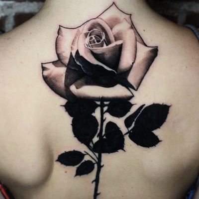 Rose tattoo by R17 #R17 #coveruptattoos #blackandgrey #blackfill #rose #realism #realistic #flower #leaves #thorns #nature #tattoooftheday