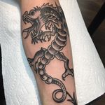 Blackwork Sailor Jerry dragon tattoo by Jhon Rodriguez. #blackwork #traditional #dragon #SailorJerry #JhonRodriguez