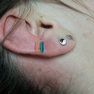 Rainbow ear (via IG—jeremyscott_tattoo)  #PrideTattoo #PrideFlag #LGBT #Equality #Rainbow #RainbowTattoo
