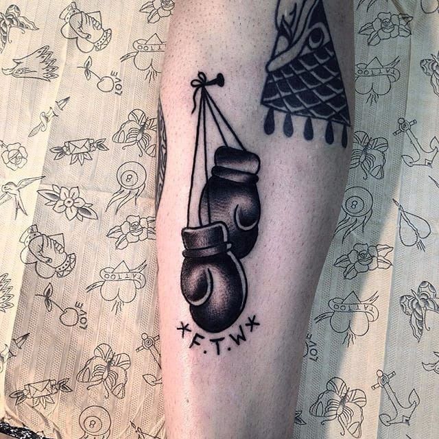 Boxing gloves tattoo by Austin