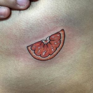 Sweet citrus slice tattoo by Mattie Sandchez. #orange #citrus #fruit #traditional #MattieSandchez