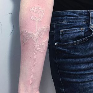 White ink tattoo by Mirko Sata. #MirkoSata #whiteink #serpent #rose