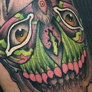 It's trippy how this skull is a moth and vise versa. Tattoo by Scott Garitson (IG—scottgaritsontattoo). #moth #ScottGaritson #skull #surreal #traditional #vibrant